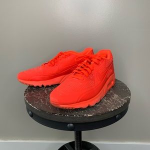 Red Nike AirMax sneakers